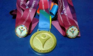 Medalla y reconocimientos de Karla.